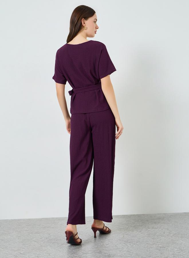 ستايلي طقم من بلوزة بارزة الملمس وبنطال بأرجل واسعة - Image 4